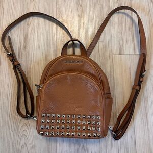 Michael Kors Abbey XS studded backpack in acorn